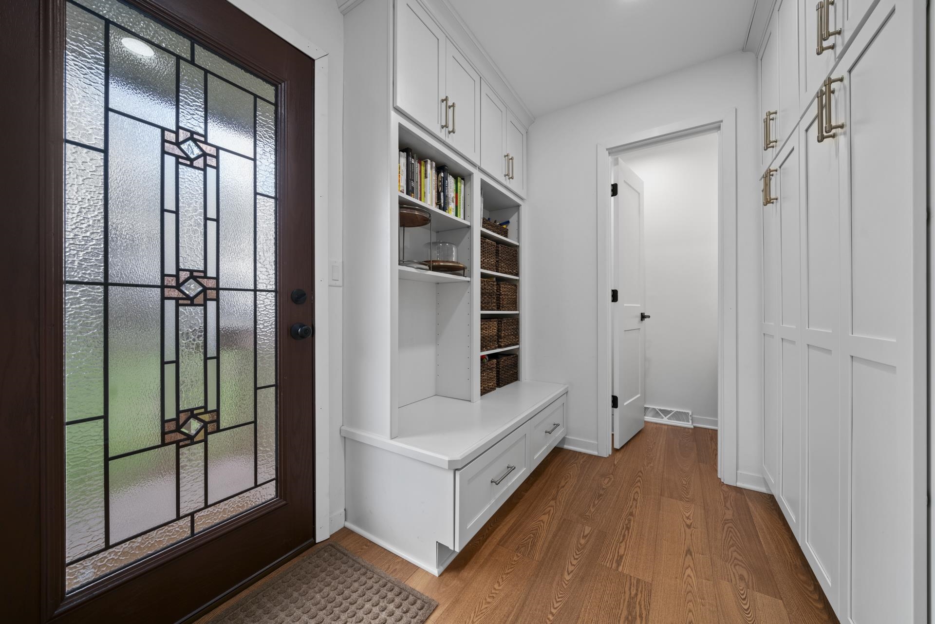 3075 East Water Road Byron, IL 61010 - Photo 15 of 46 a view of a hallway with wooden floor and entryway
