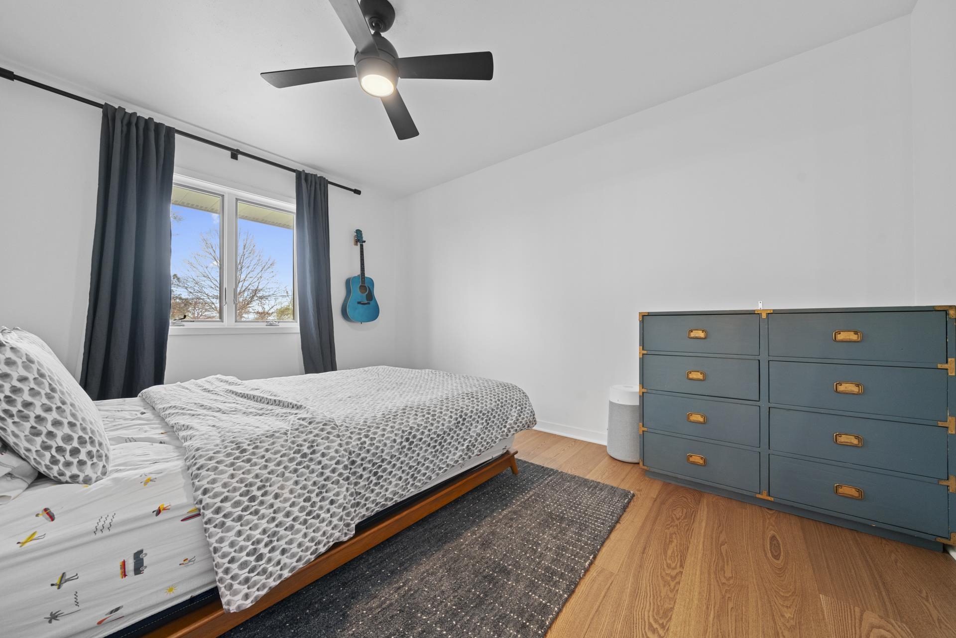 3075 East Water Road Byron, IL 61010 - Photo 23 of 46 a bedroom with a bed and a dresser