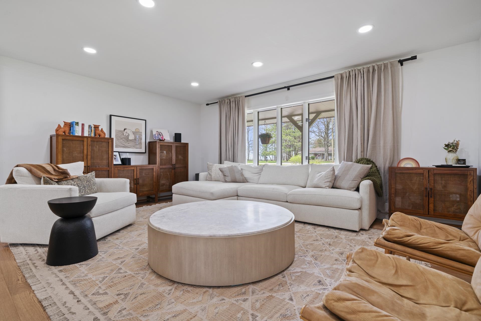 3075 East Water Road Byron, IL 61010 - Photo 3 of 46 a living room with furniture and a large window
