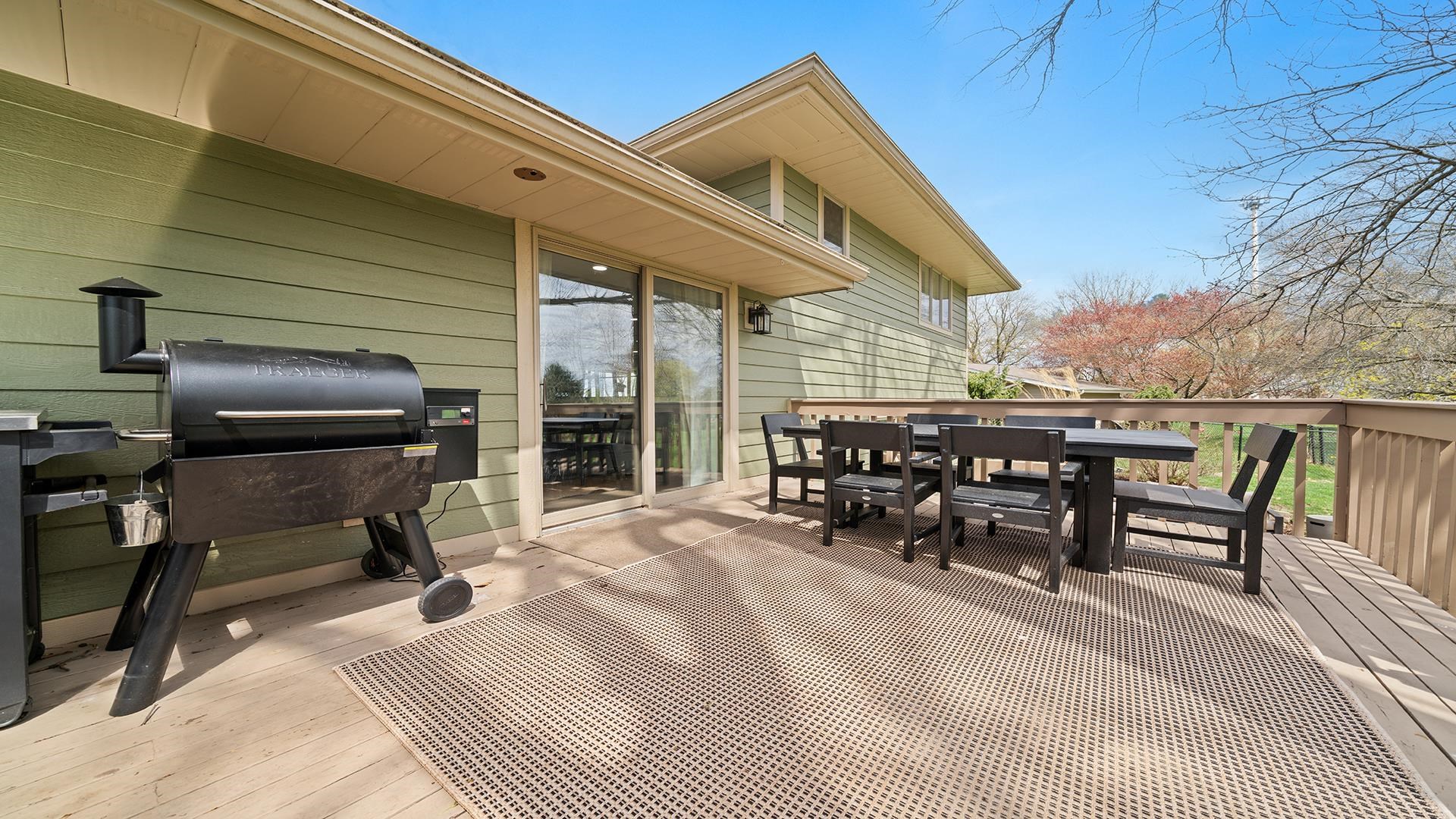 3075 East Water Road Byron, IL 61010 - Photo 36 of 46 a view of a dinning table and chairs in the patio