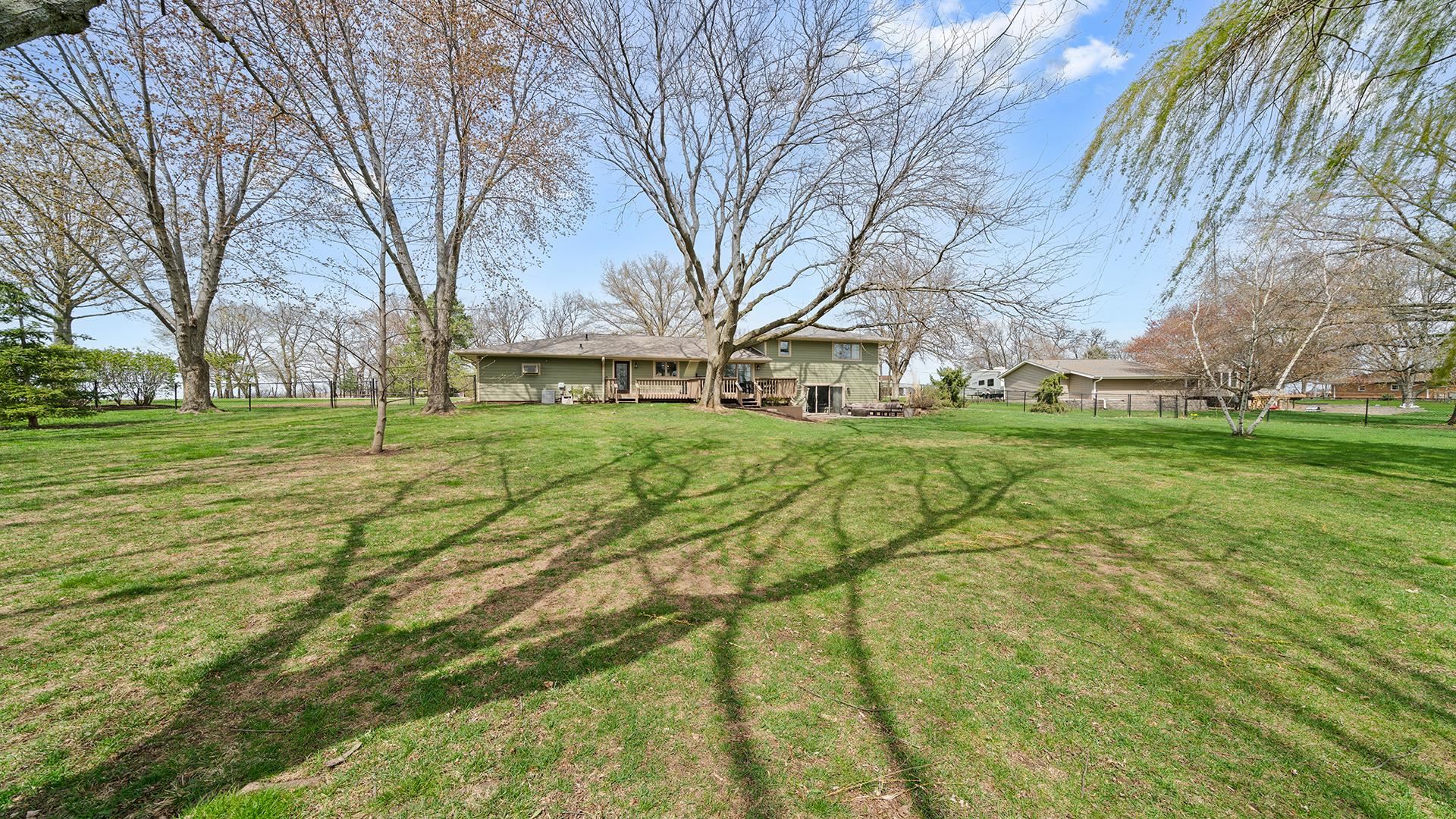 3075 East Water Road Byron, IL 61010 - Photo 41 of 46 a view of yard with trees
