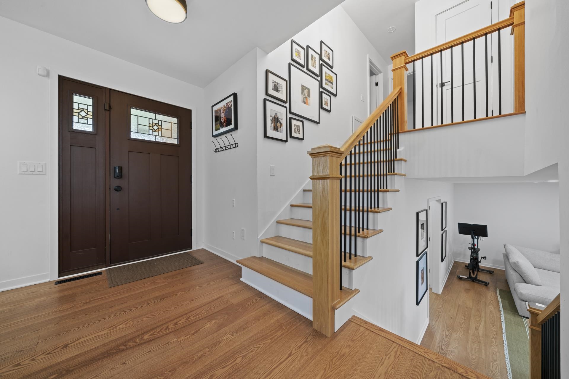 3075 East Water Road Byron, IL 61010 - Photo 5 of 46 a view of entryway with stairs and wooden floor