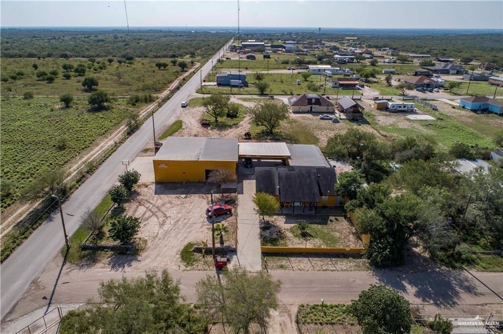 15 El Mesquite Lane Rio Grande City, TX 78582 - Photo 28 of 30 an aerial view of a house with a yard