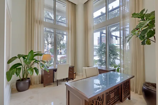 a view of a living room and dining room
