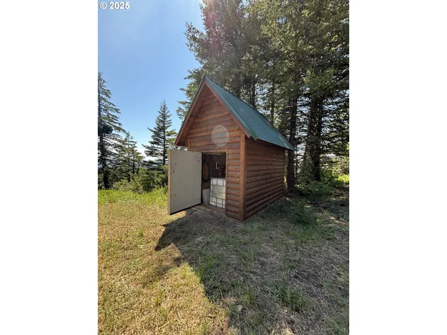 a view of a house with a sink and yard