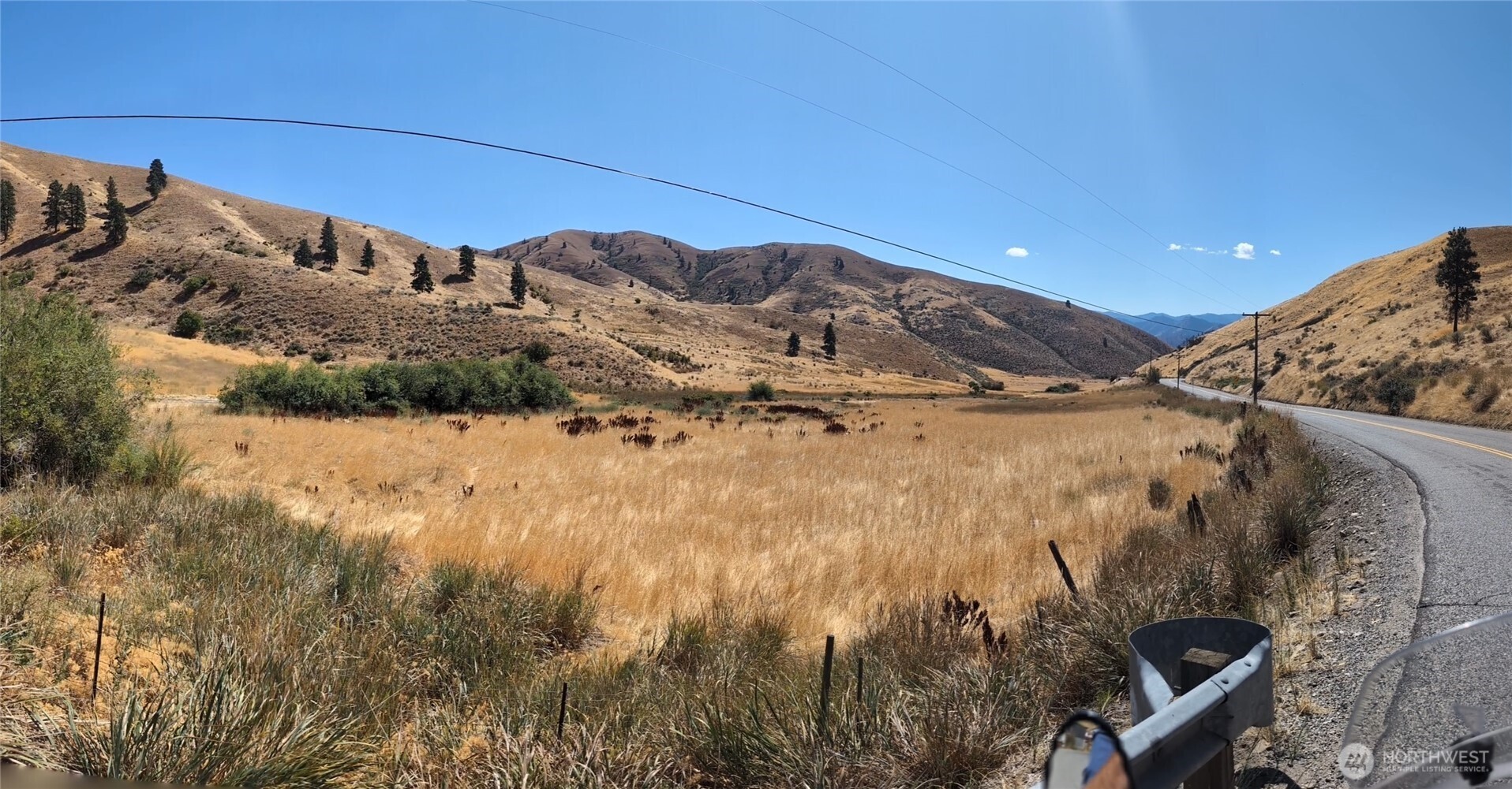 8 Nahahum Canyon Road Cashmere, WA 98815 - Photo 2 of 4 a view of a houses with a snow in the background