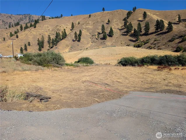 a view of ocean with a mountain