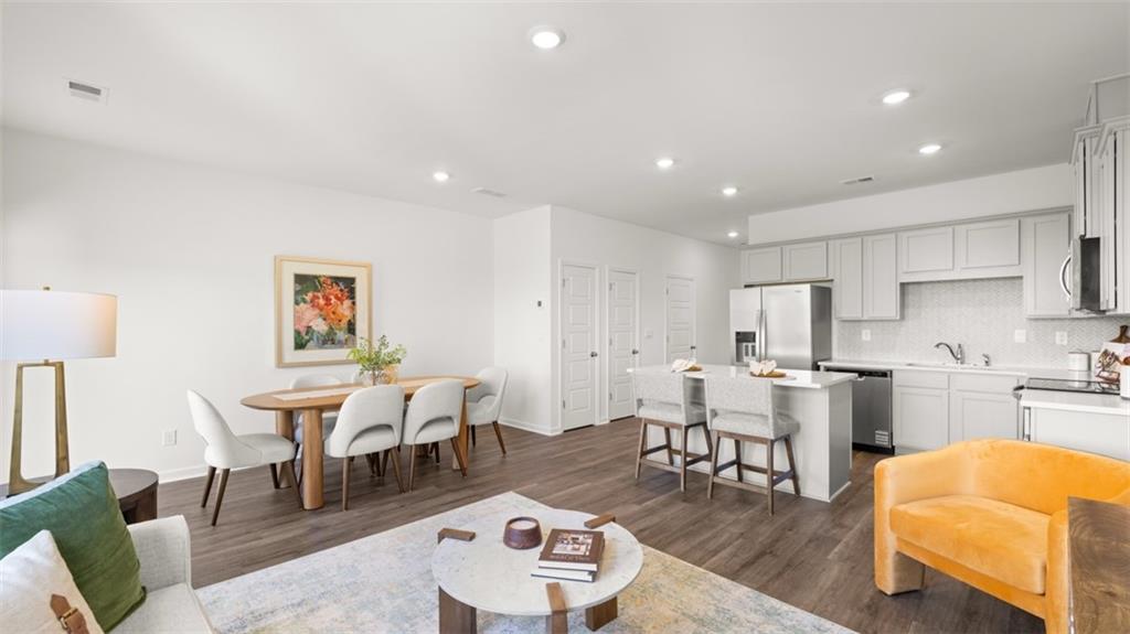 200 Kenmore Circle Perry, GA 31069 - Photo 14 of 47 a living room with stainless steel appliances furniture and a kitchen view