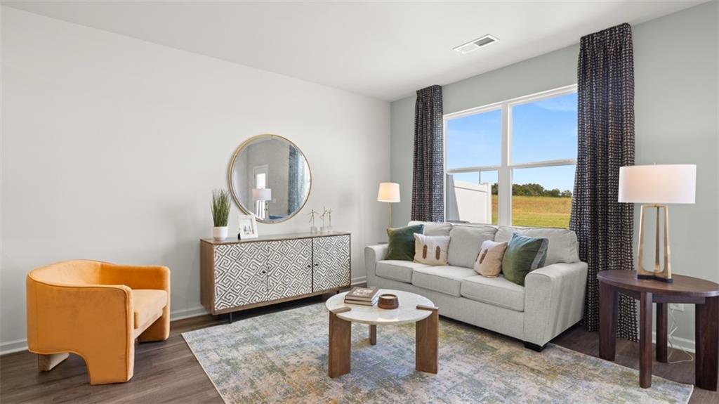 200 Kenmore Circle Perry, GA 31069 - Photo 20 of 47 a living room with furniture and a mirror