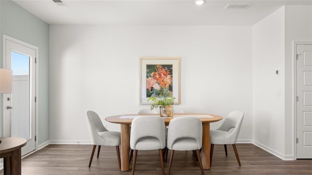 200 Kenmore Circle Perry, GA 31069 - Photo 22 of 47 a dining room with furniture and wooden floor