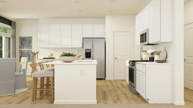 a kitchen with a sink a stove and refrigerator