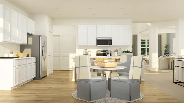 a kitchen with stainless steel appliances kitchen island granite countertop a refrigerator a stove top oven and a view of living room