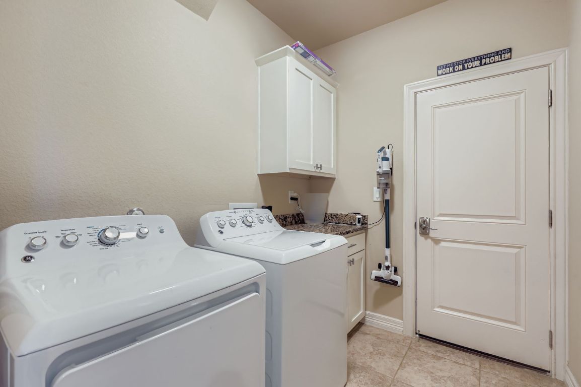 19004 Mariners Point Lago Vista, TX 78645 - Photo 15 of 23 a view of utility room with washer and dryer