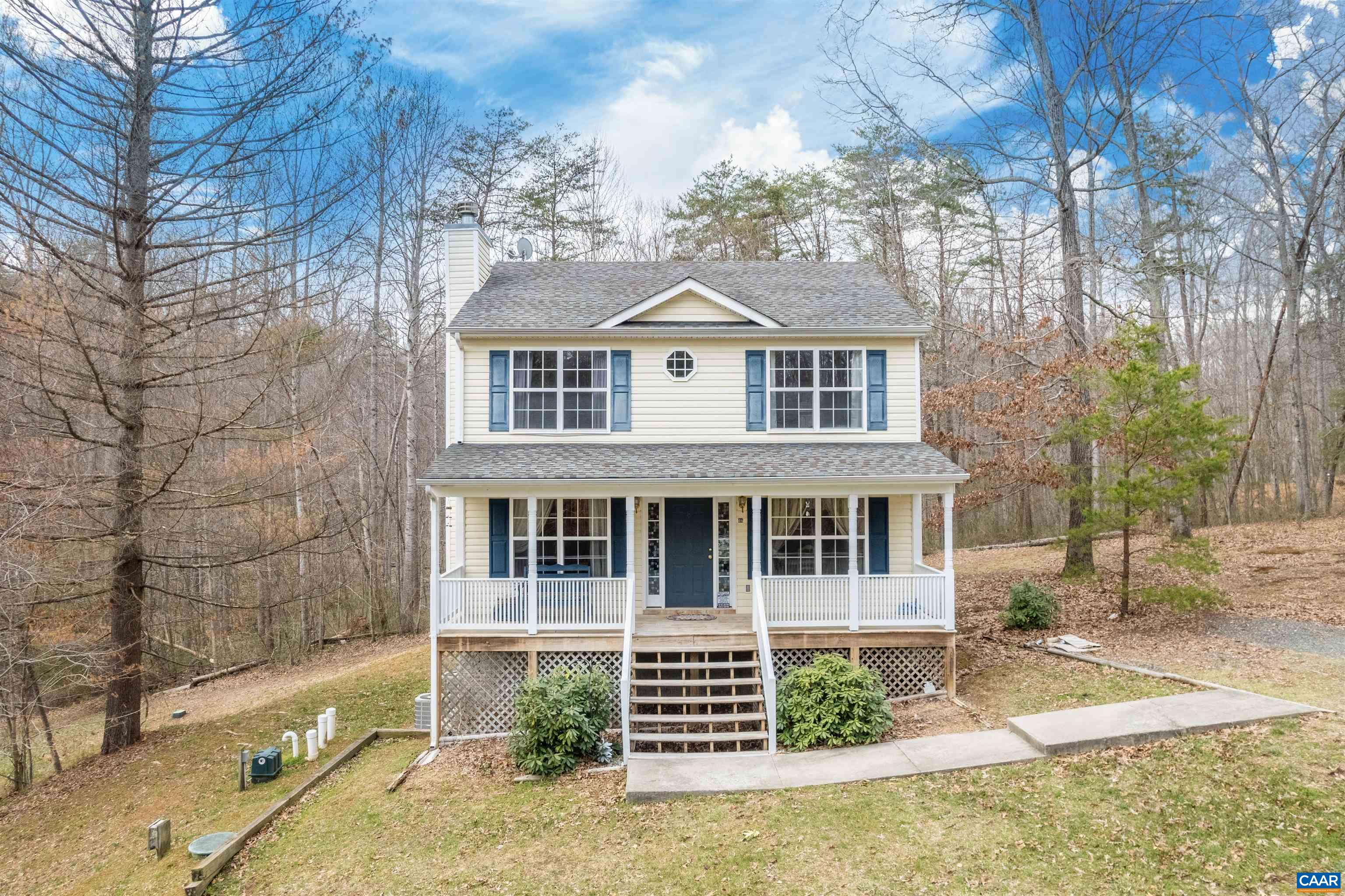 46 Lilac Road Ruckersville, VA 22968 - Photo 1 of 26 a front view of a house with a garden