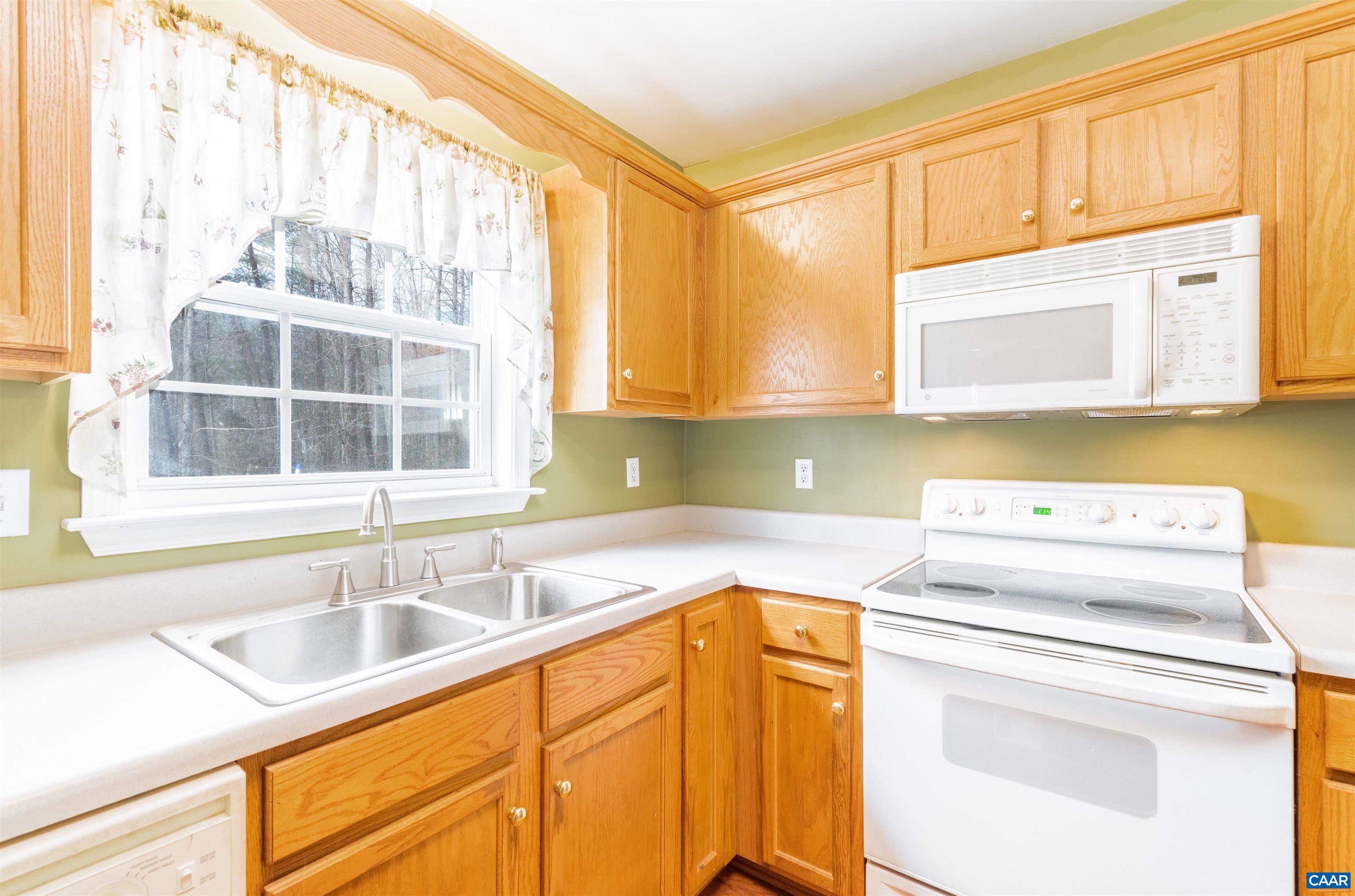 46 Lilac Road Ruckersville, VA 22968 - Photo 11 of 26 a view of a kitchen sink and a window