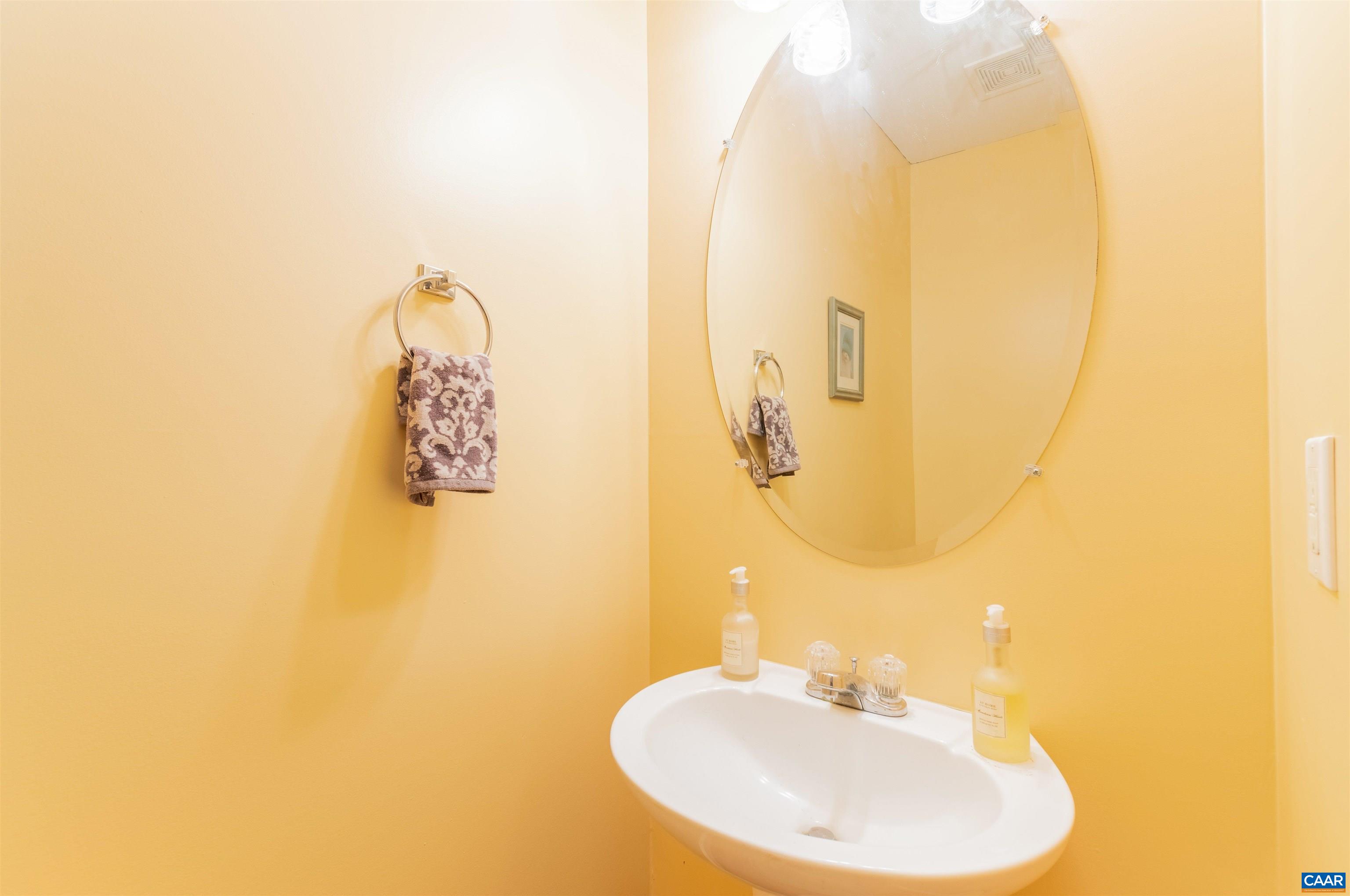 46 Lilac Road Ruckersville, VA 22968 - Photo 14 of 26 a bathroom with a sink and a mirror