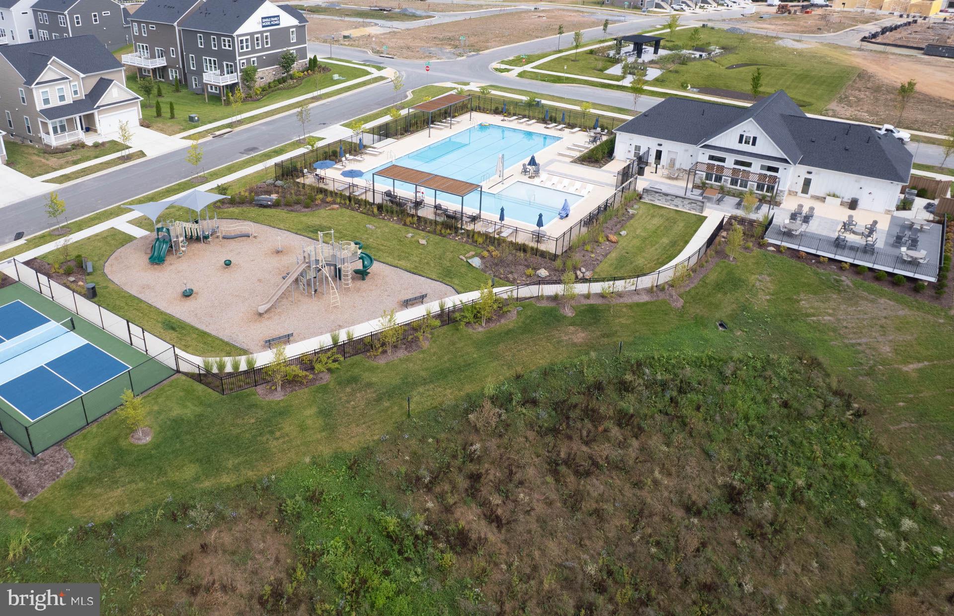 14495 Leafhopper Drive Boyds, MD 20841 - Photo 29 of 37 an aerial view of a house with a swimming pool