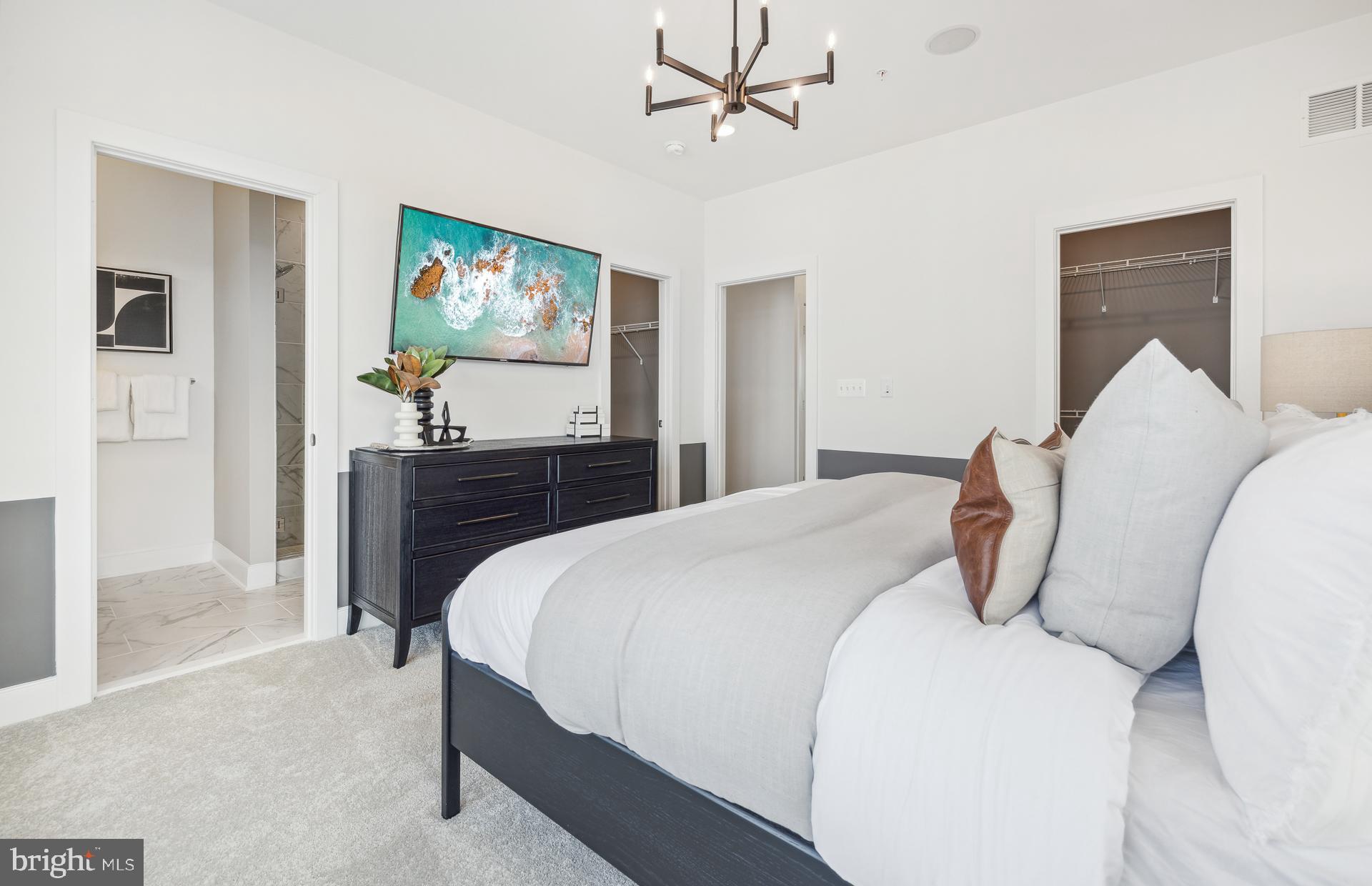 14495 Leafhopper Drive Boyds, MD 20841 - Photo 8 of 37 a bedroom with a bed and painting on the wall