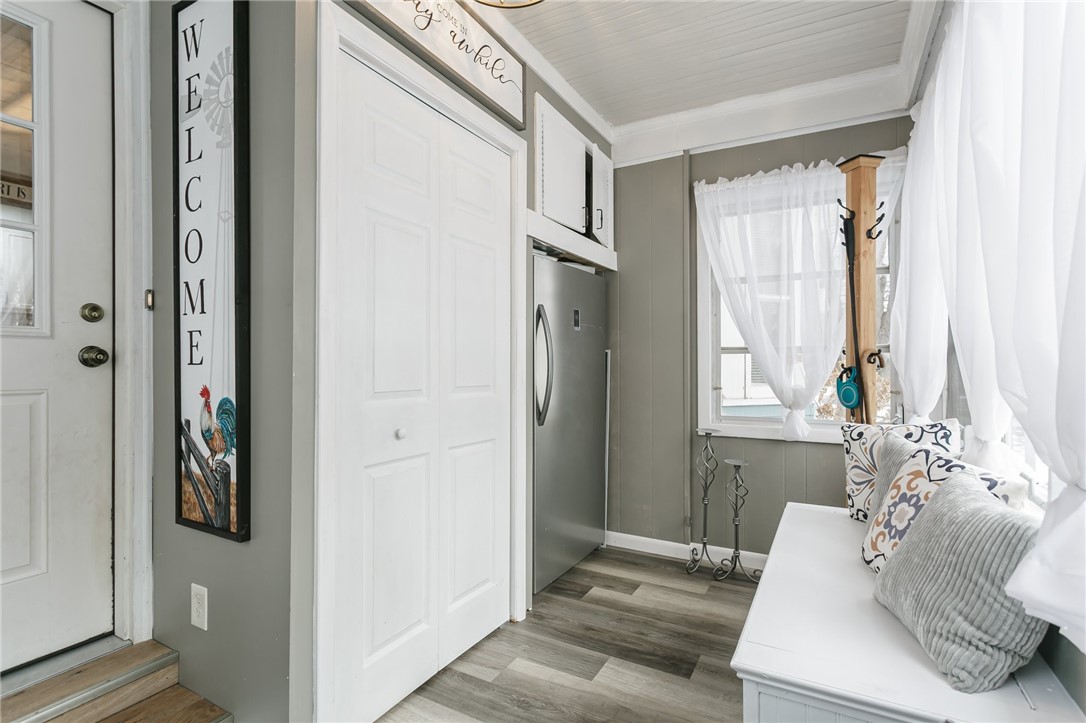 495 Coldwater Road Gates, NY 14624 - Photo 19 of 48 Enclosed porch serves as a mudroom & offers storag
