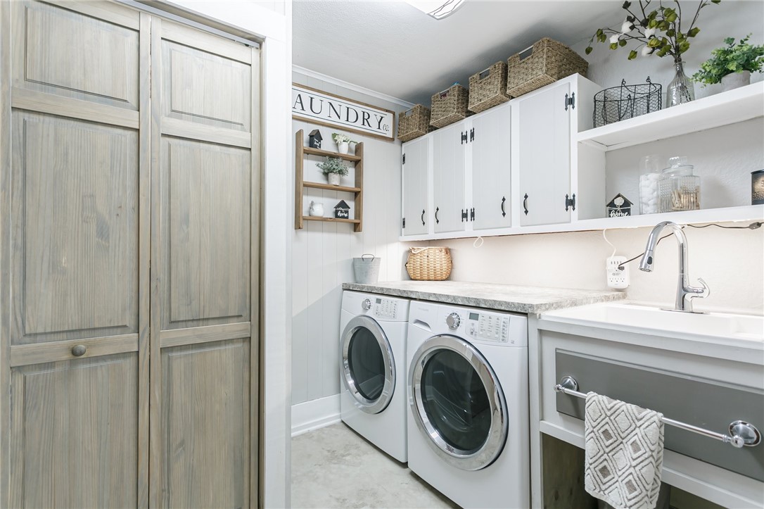 495 Coldwater Road Gates, NY 14624 - Photo 20 of 48 1st floor laundry room/half bath with large closet