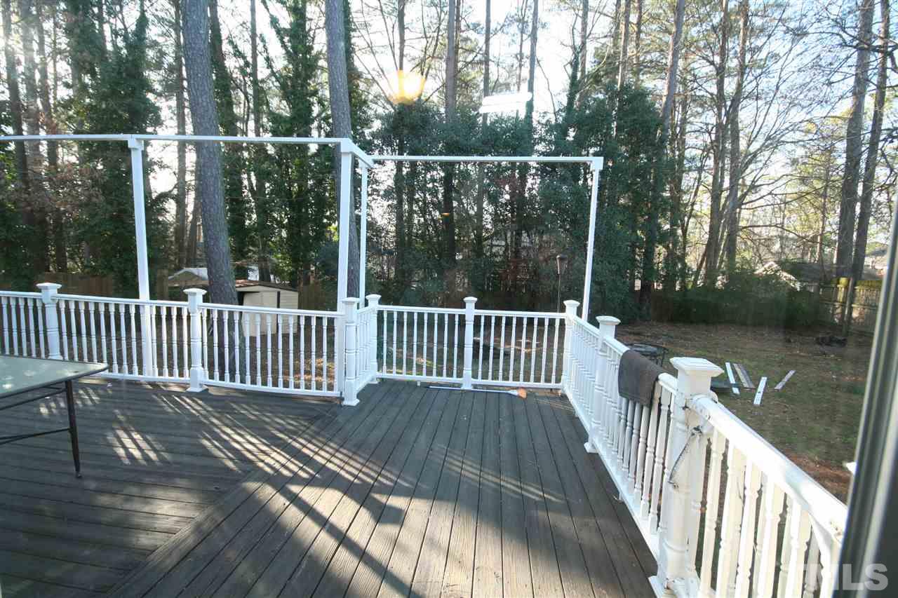 5821 Morning Forest Drive Raleigh, NC 27609 - Photo 12 of 25 a view of a balcony with wooden floor