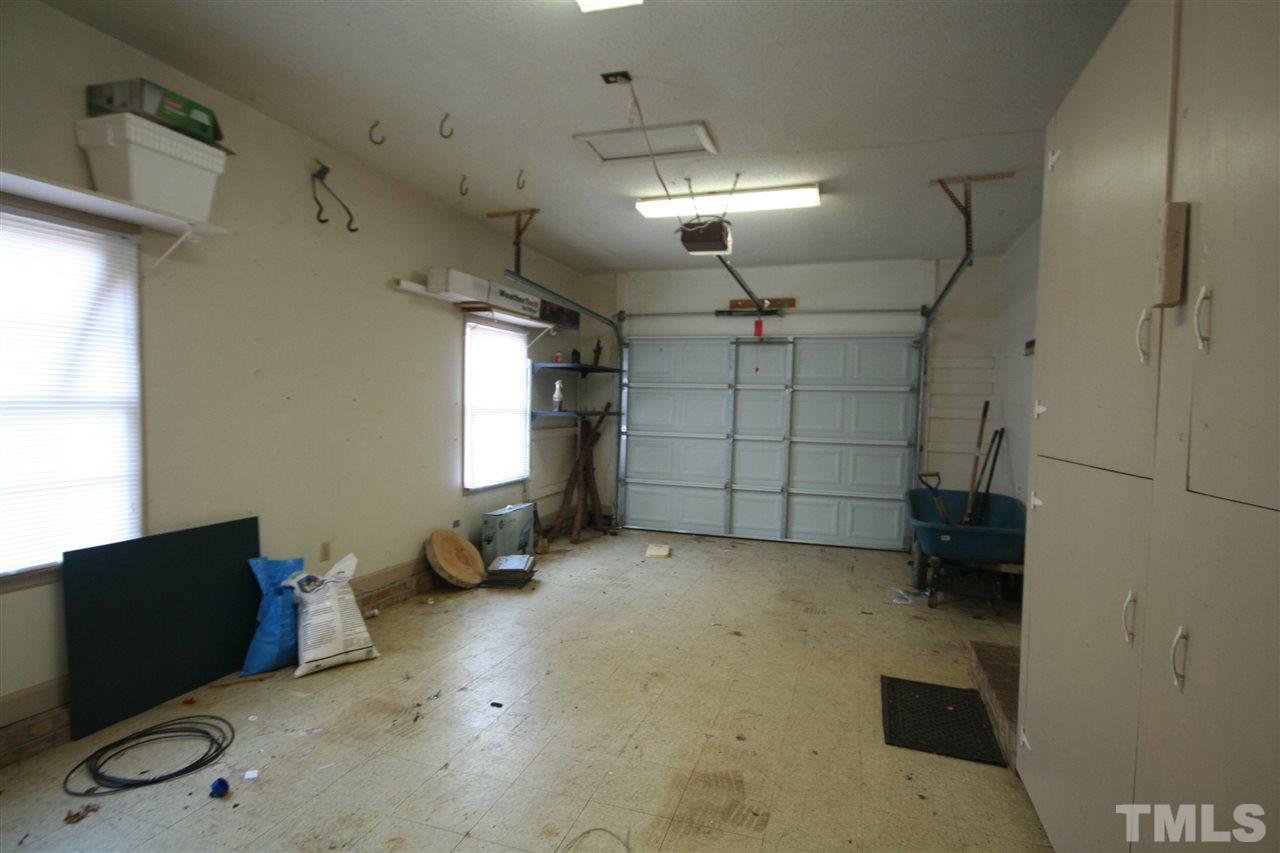 5821 Morning Forest Drive Raleigh, NC 27609 - Photo 23 of 25 a view of a garage