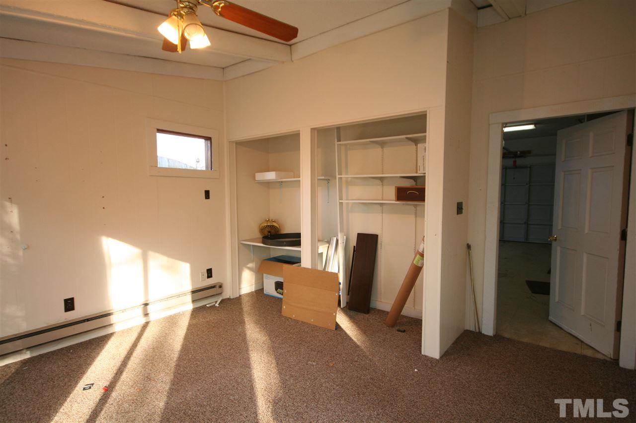 5821 Morning Forest Drive Raleigh, NC 27609 - Photo 24 of 25 a view of a livingroom with a flat screen tv
