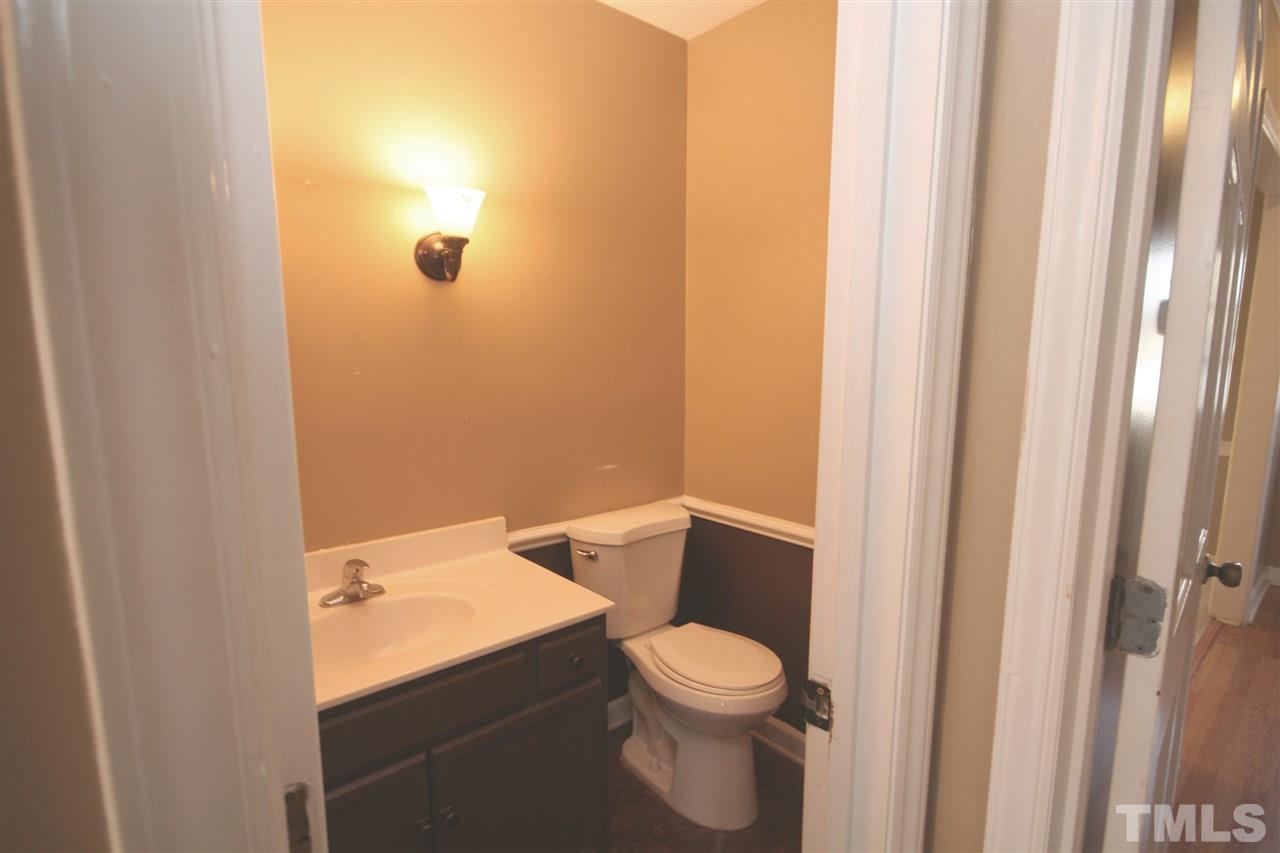 5821 Morning Forest Drive Raleigh, NC 27609 - Photo 9 of 25 a white toilet sitting next to a shower