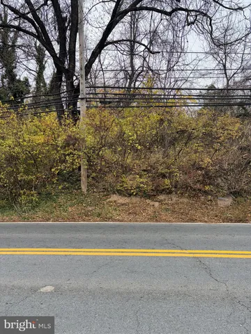 a view of swimming pool with an outdoor space and seating area
