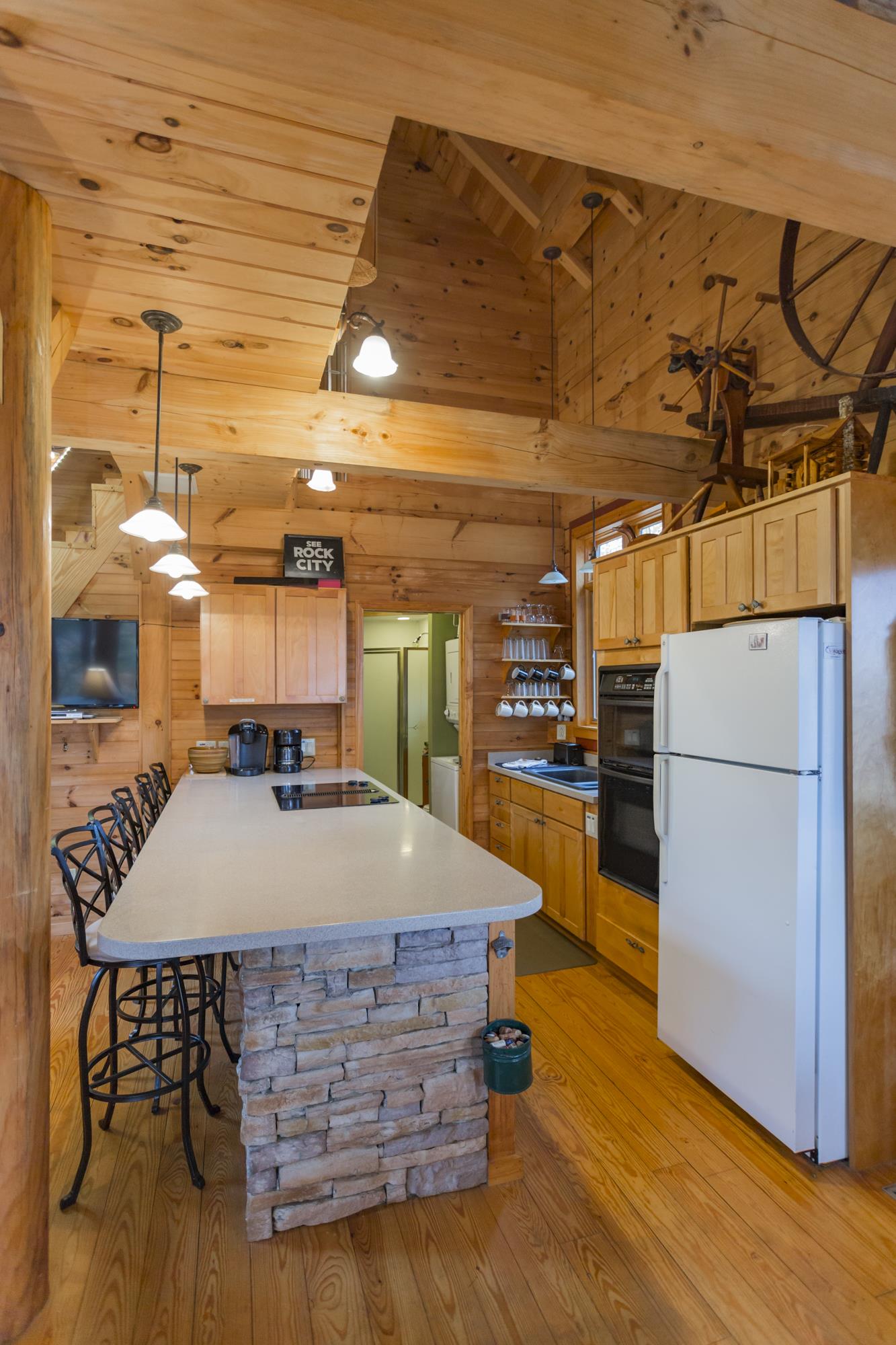 131 Roth Point Road Altamont, TN 37301 - Photo 8 of 30 A full kitchen that is open to the dining and living area keeps everyone together