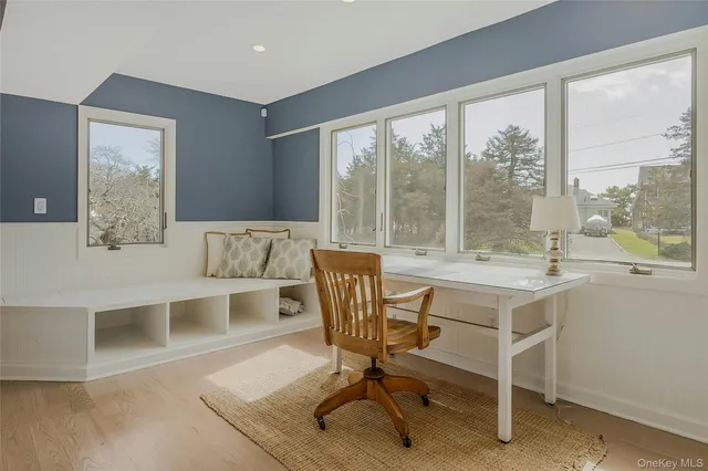 a view of a dining room with furniture window and outside view