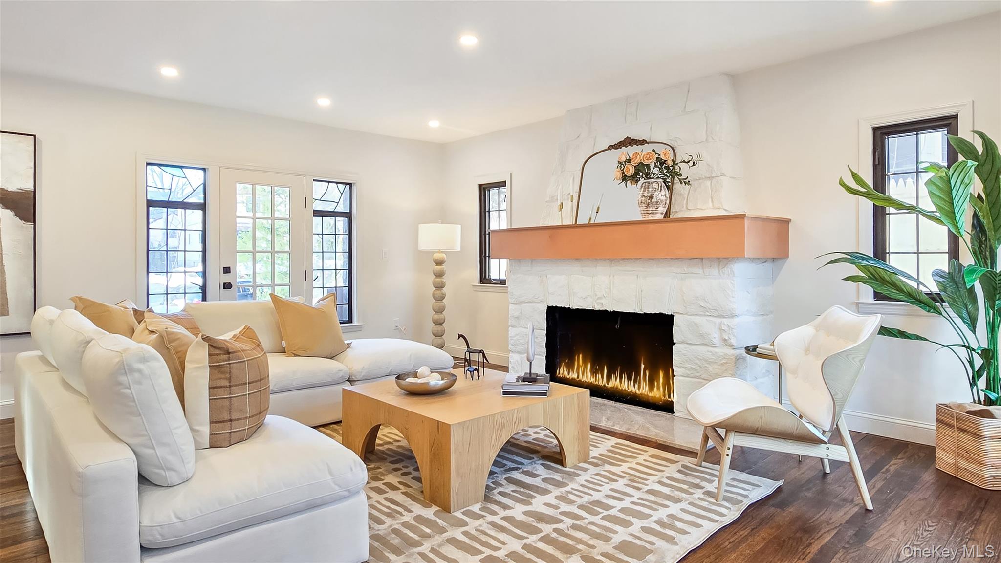 18 Lakeside Drive New Rochelle, NY 10801 - Photo 12 of 43 a living room with furniture and a fireplace