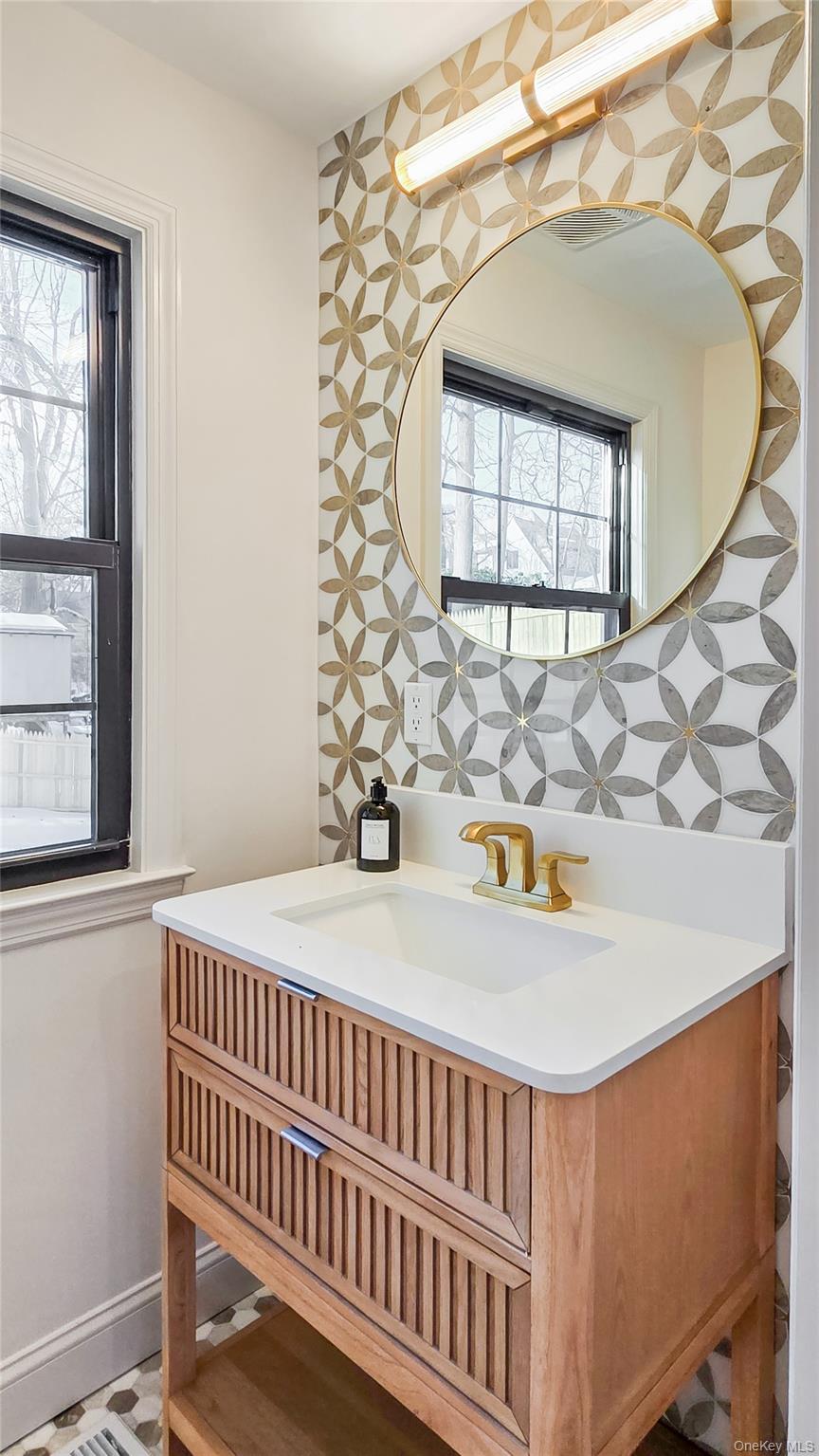 18 Lakeside Drive New Rochelle, NY 10801 - Photo 15 of 43 a bedroom with a bed and a window
