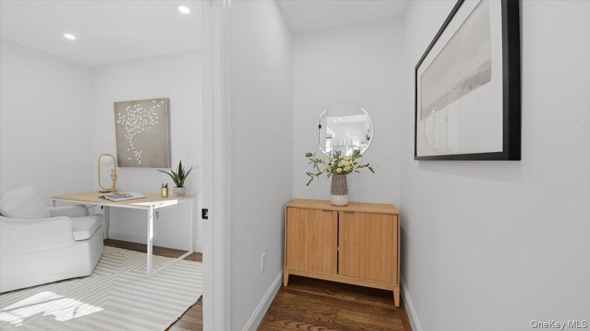 18 Lakeside Drive New Rochelle, NY 10801 - Photo 16 of 43 a view of bathroom with a sink mirror and toilet