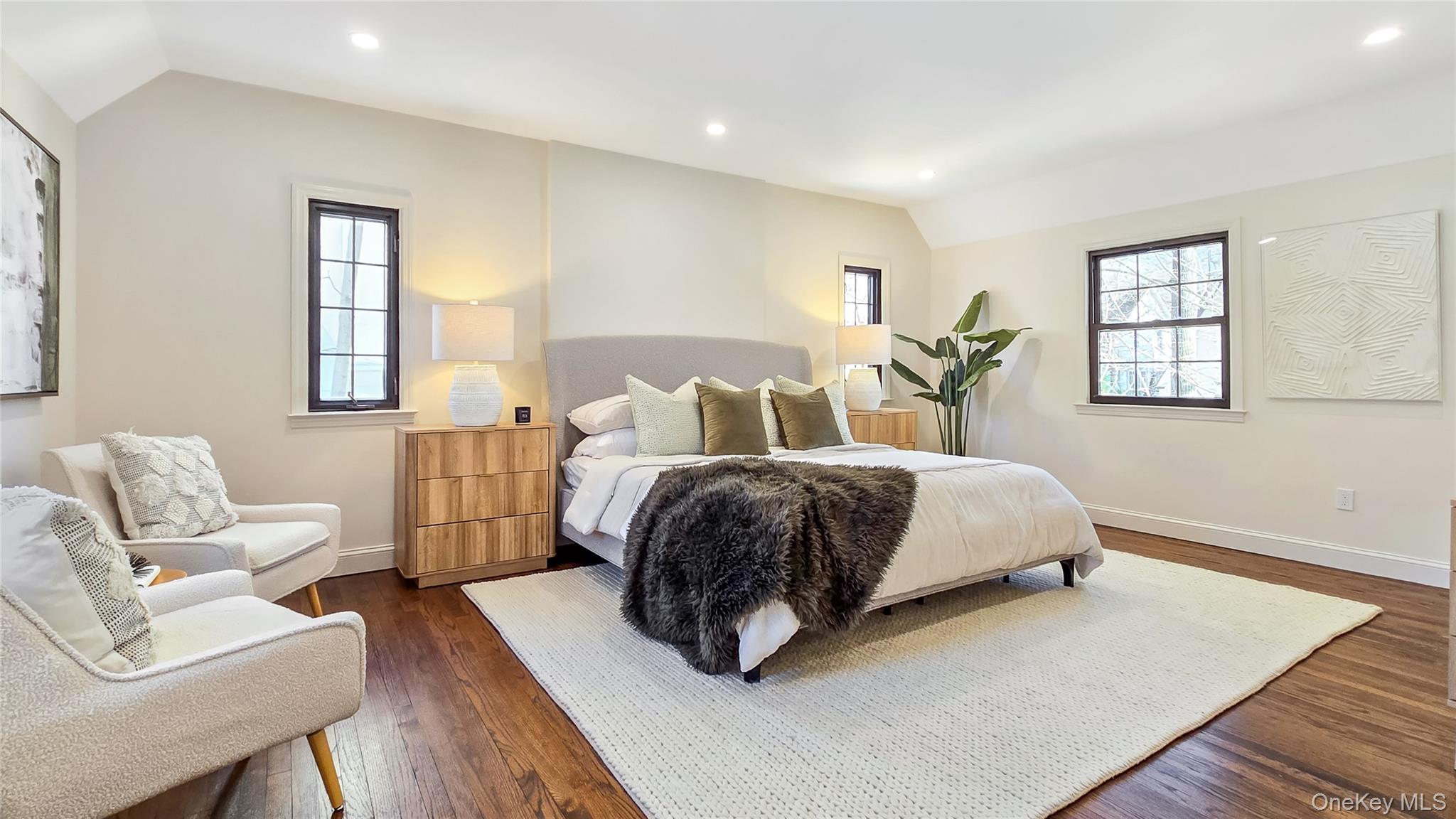 18 Lakeside Drive New Rochelle, NY 10801 - Photo 20 of 43 a bedroom with a bed and wooden floor