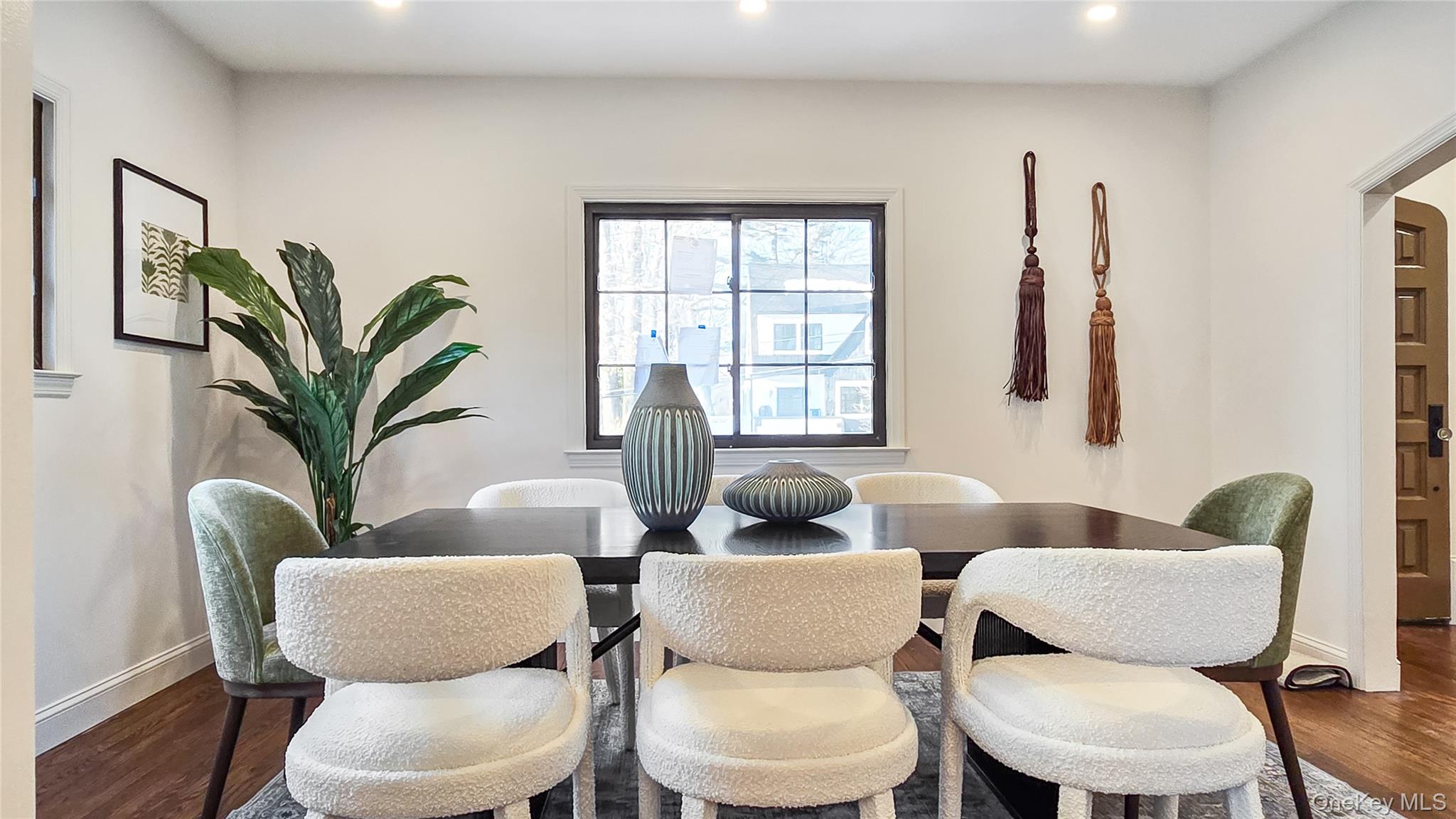18 Lakeside Drive New Rochelle, NY 10801 - Photo 3 of 43 a dining room with furniture and wooden floor