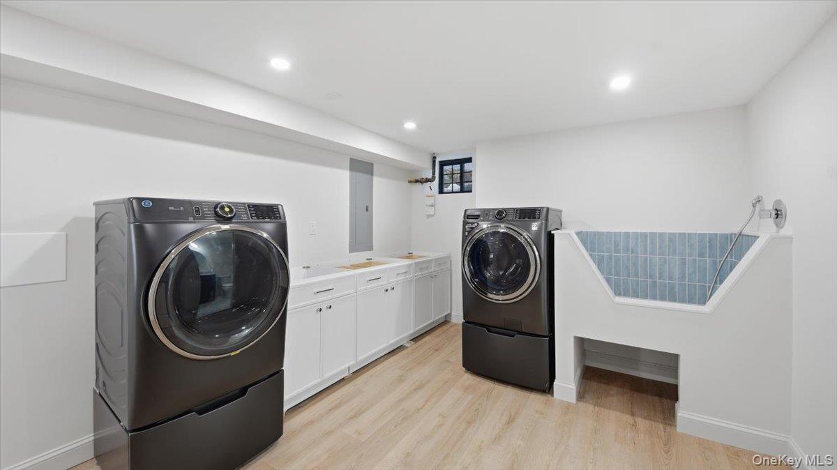 18 Lakeside Drive New Rochelle, NY 10801 - Photo 33 of 43 a utility room with sink dryer and washer