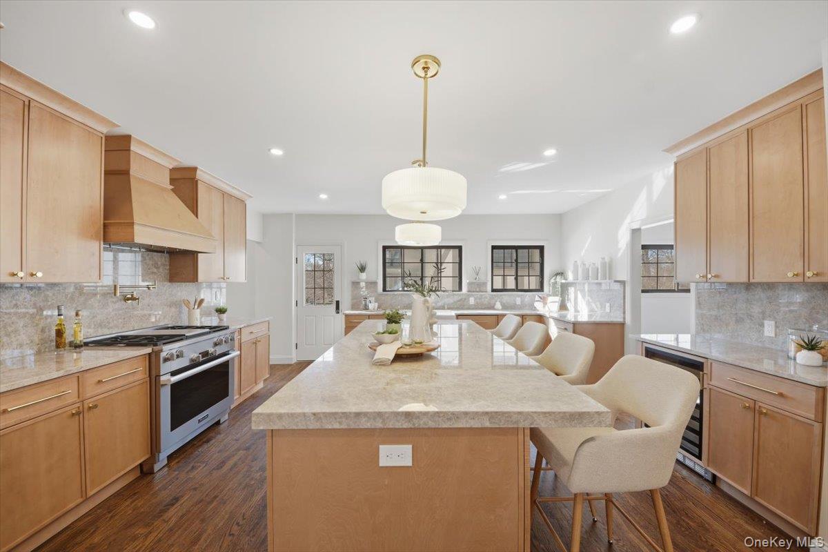 18 Lakeside Drive New Rochelle, NY 10801 - Photo 5 of 43 a view of a kitchen counter top space a sink stainless steel appliances and cabinets