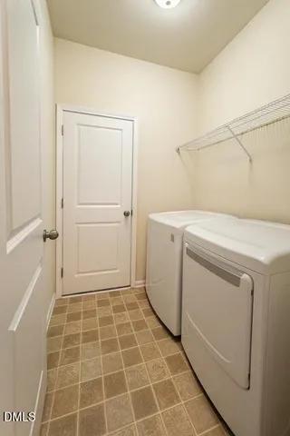 a view of a big room with carpet