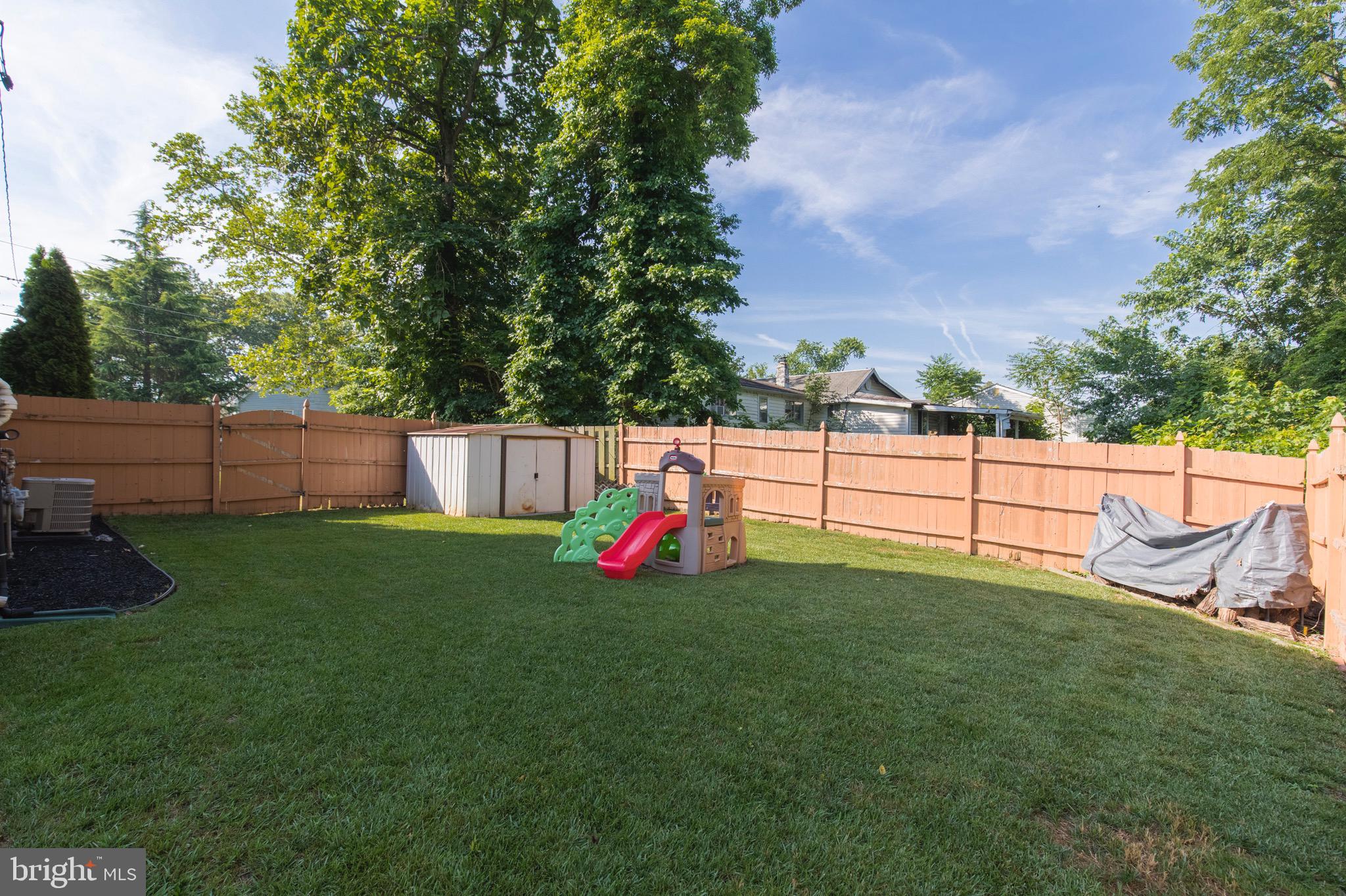 433 Ridge Avenue Glendora, NJ 08029 - Photo 36 of 42 Large side yard with shed.
