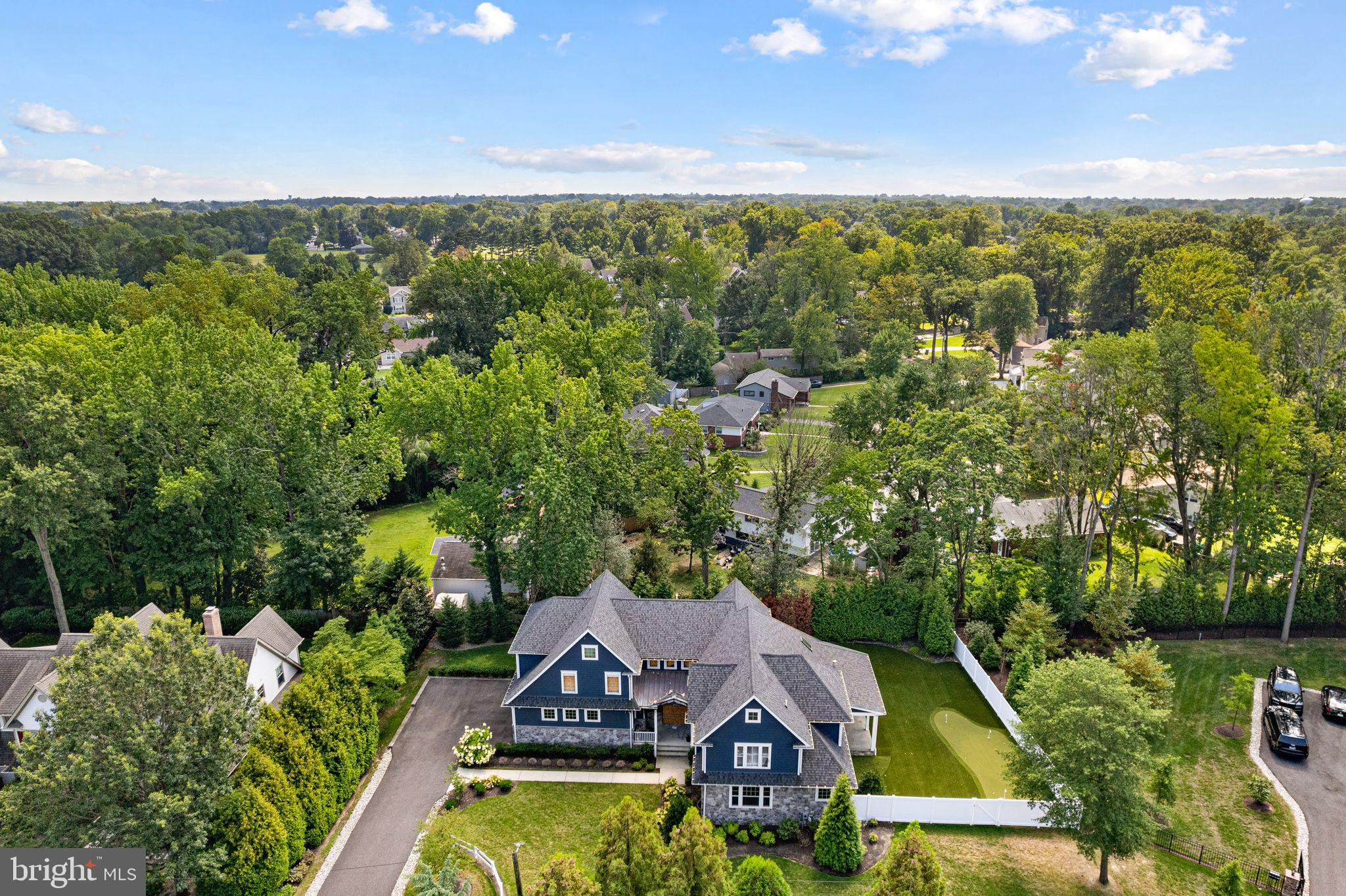582 Jobel Drive Haddonfield, NJ 08033 - Photo 8 of 9 a view of a lake with a house in the background