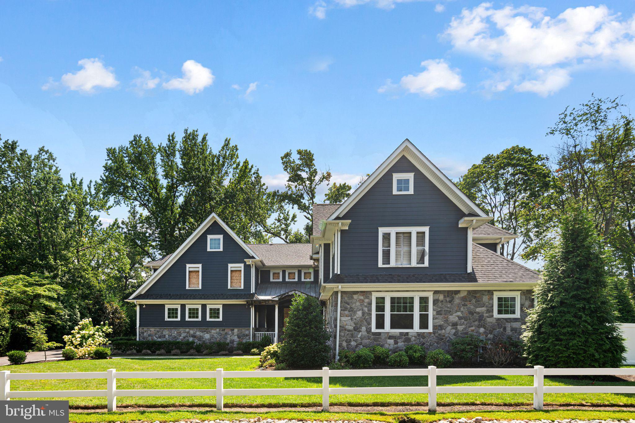 582 Jobel Drive Haddonfield, NJ 08033 - Photo 9 of 9 a front view of a house with a yard and swimming pool