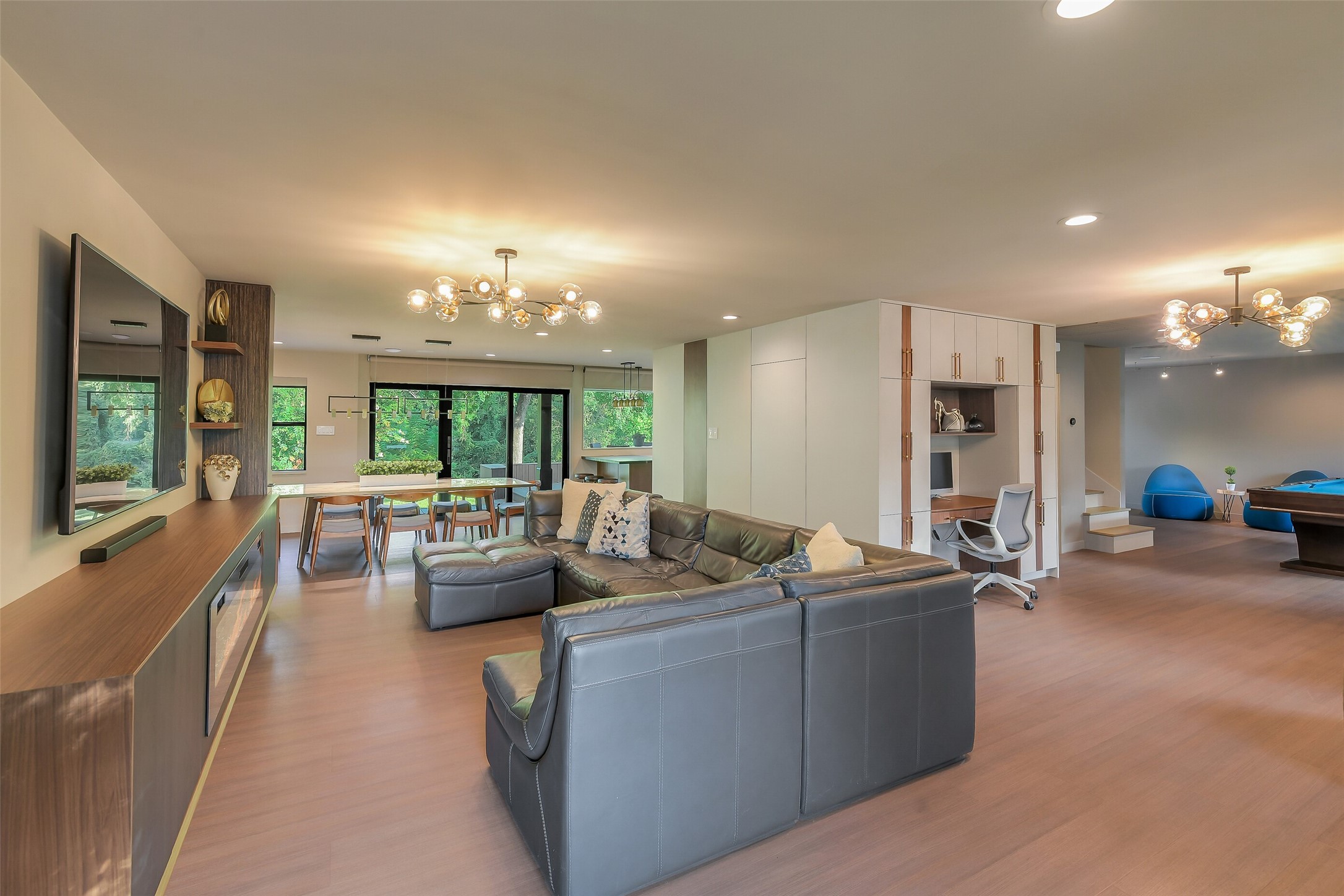 0 Camilla Lake Road Coldspring, TX 77331 - Photo 7 of 50 Brick House: The thoughtfully reimagined open-plan interior brings living, dining, workspace and entertainment areas together while still giving each space its own distinct purpose.