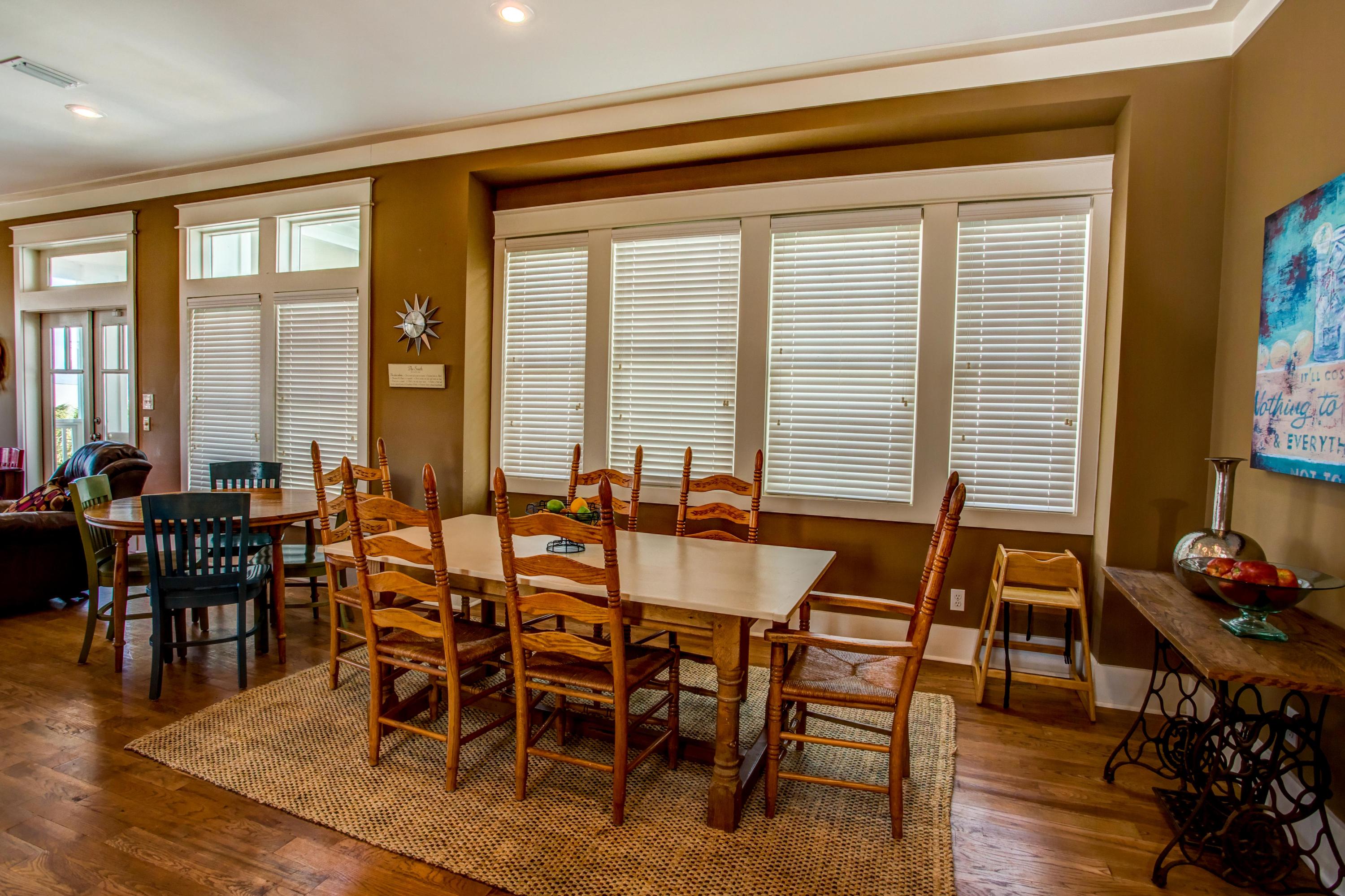 80 Chelsea Loop Road Santa Rosa Beach, FL 32459 - Photo 10 of 43 a view of a dining room with furniture and wooden floor