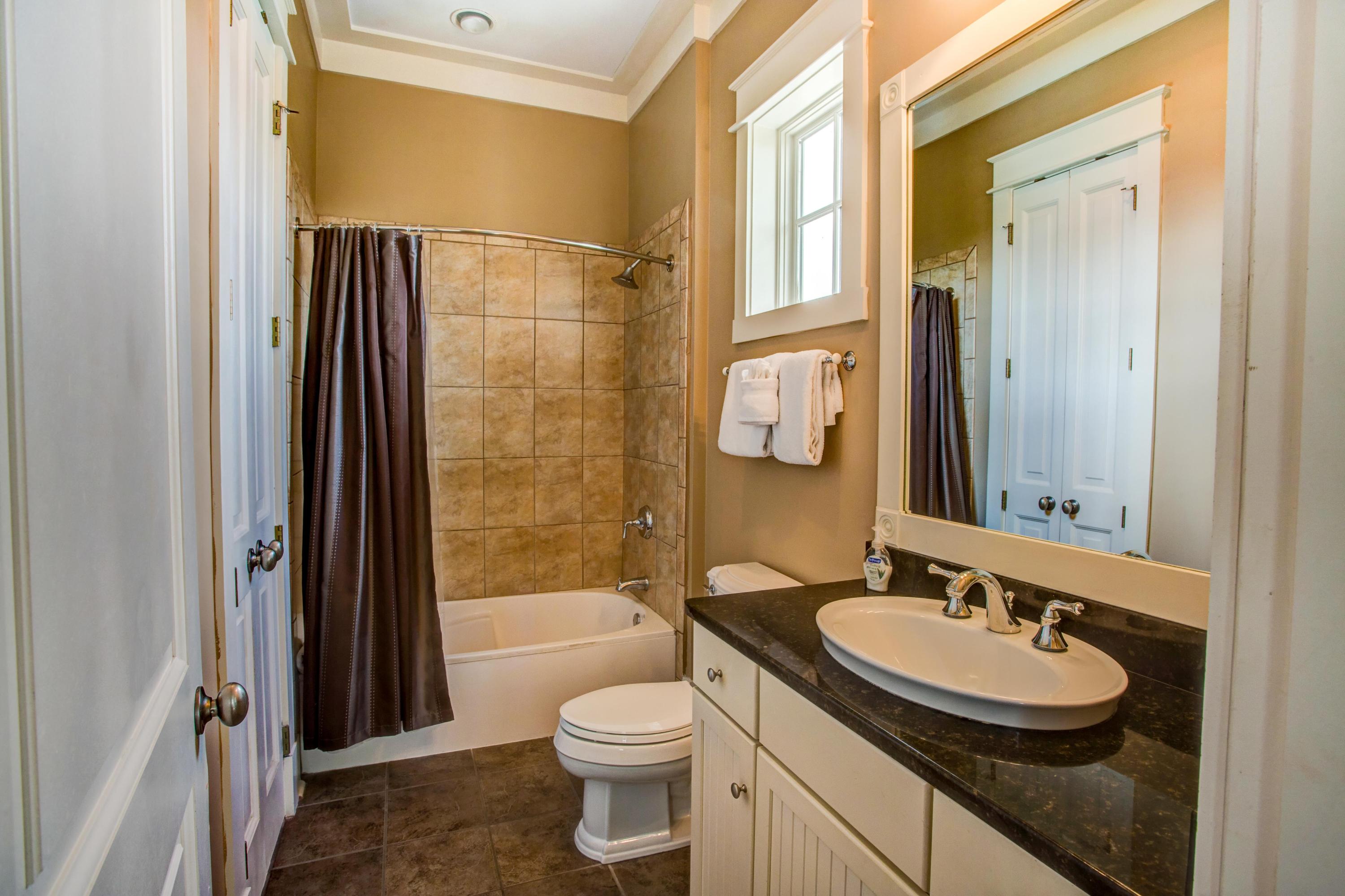80 Chelsea Loop Road Santa Rosa Beach, FL 32459 - Photo 17 of 43 a bathroom with a sink and a mirror