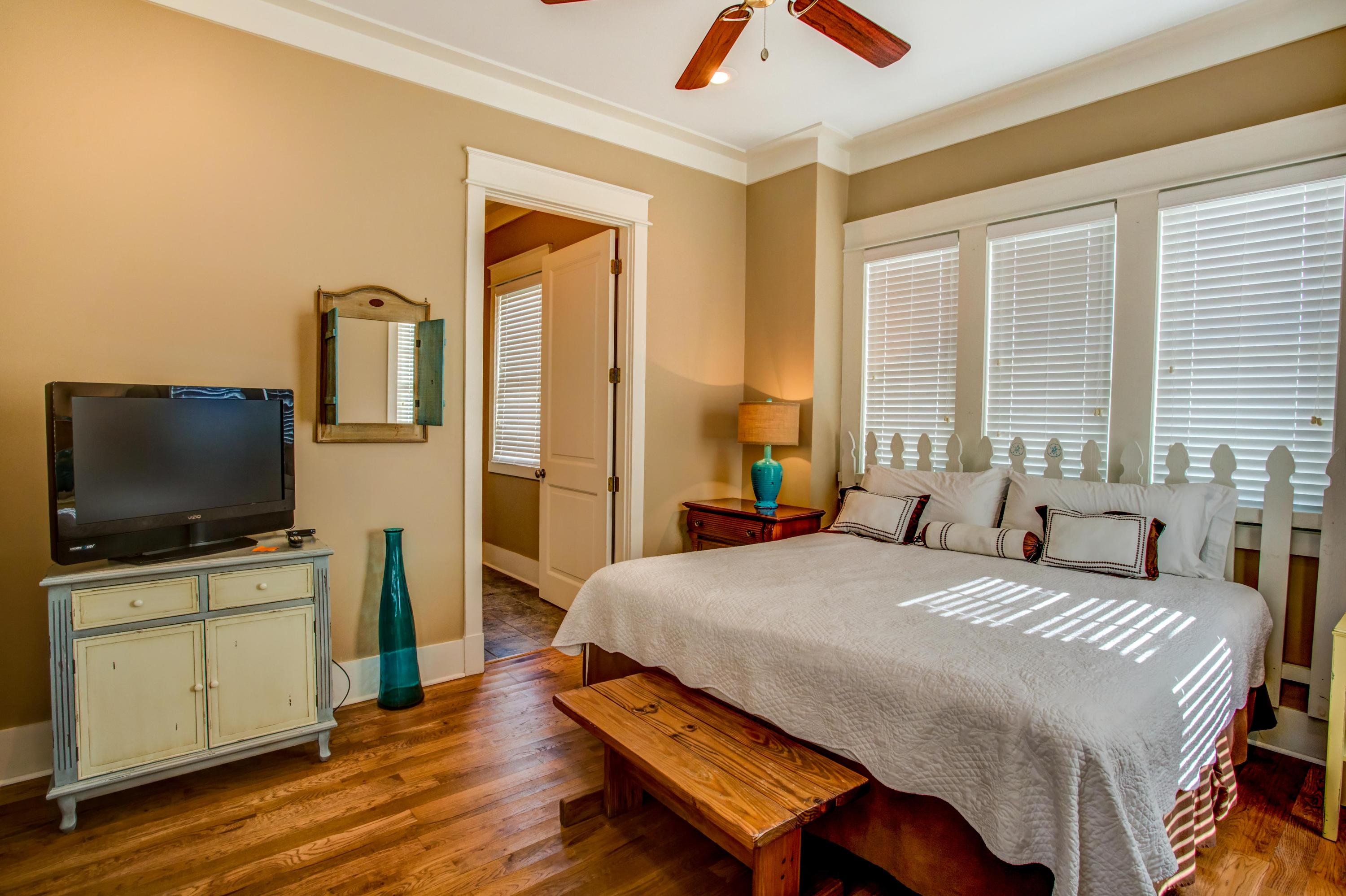 80 Chelsea Loop Road Santa Rosa Beach, FL 32459 - Photo 22 of 43 a bedroom with a bed and a flat screen tv