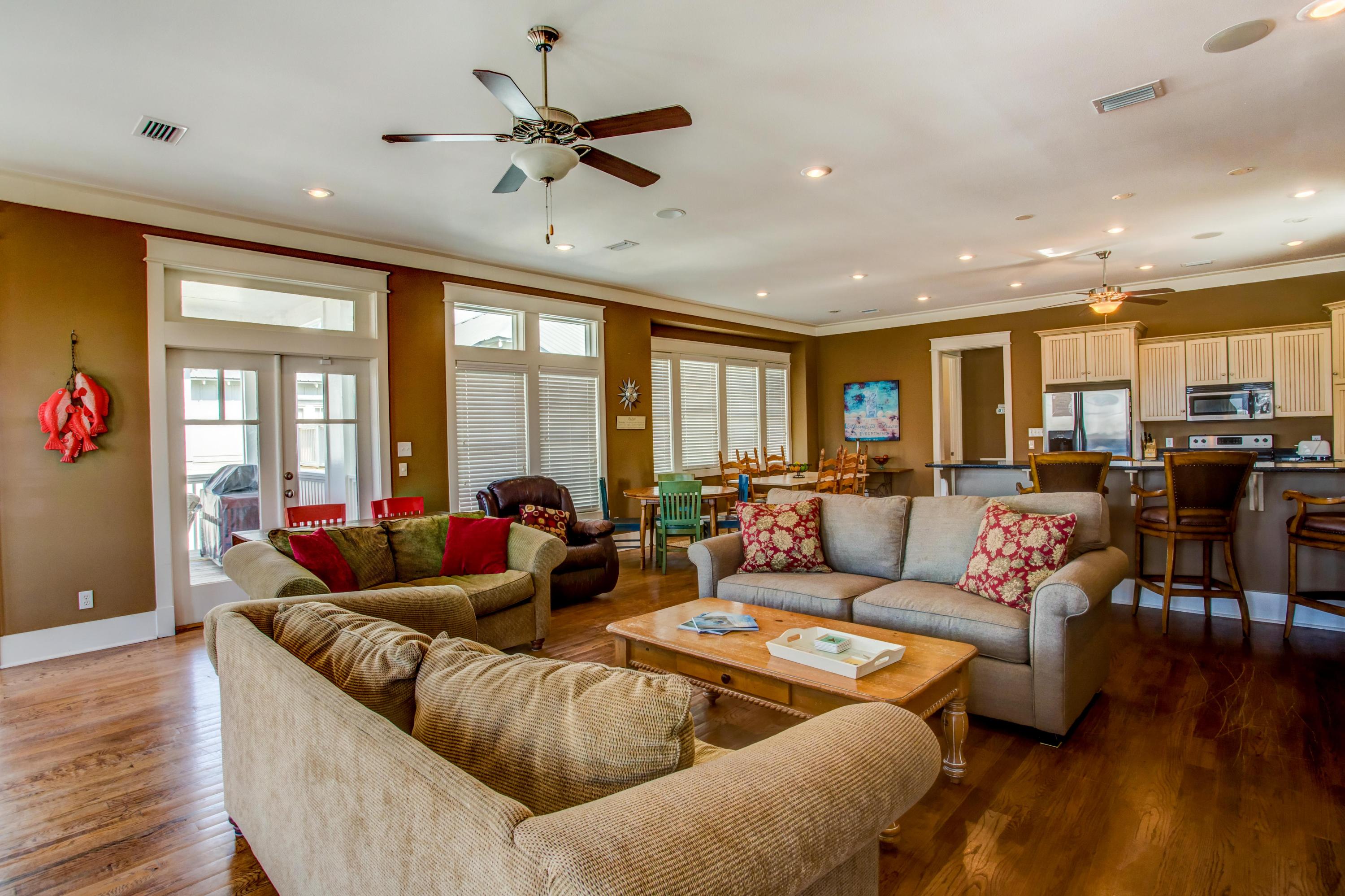 80 Chelsea Loop Road Santa Rosa Beach, FL 32459 - Photo 7 of 43 a living room with furniture and a large window