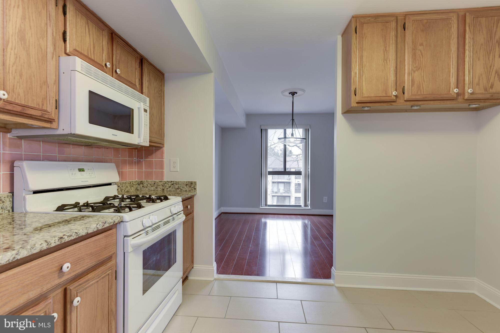2018 Colts Neck Road, Unit 22 Reston, VA 20191 - Photo 11 of 26 Kitchen with room for table and seating.