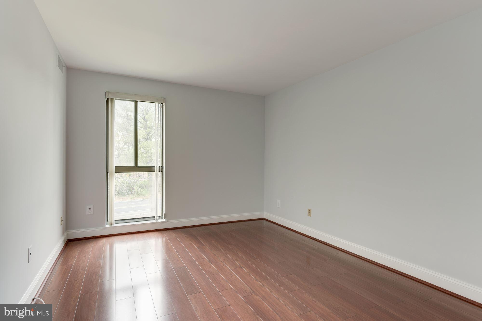 2018 Colts Neck Road, Unit 22 Reston, VA 20191 - Photo 13 of 26 Wood Floors in Bedrooms