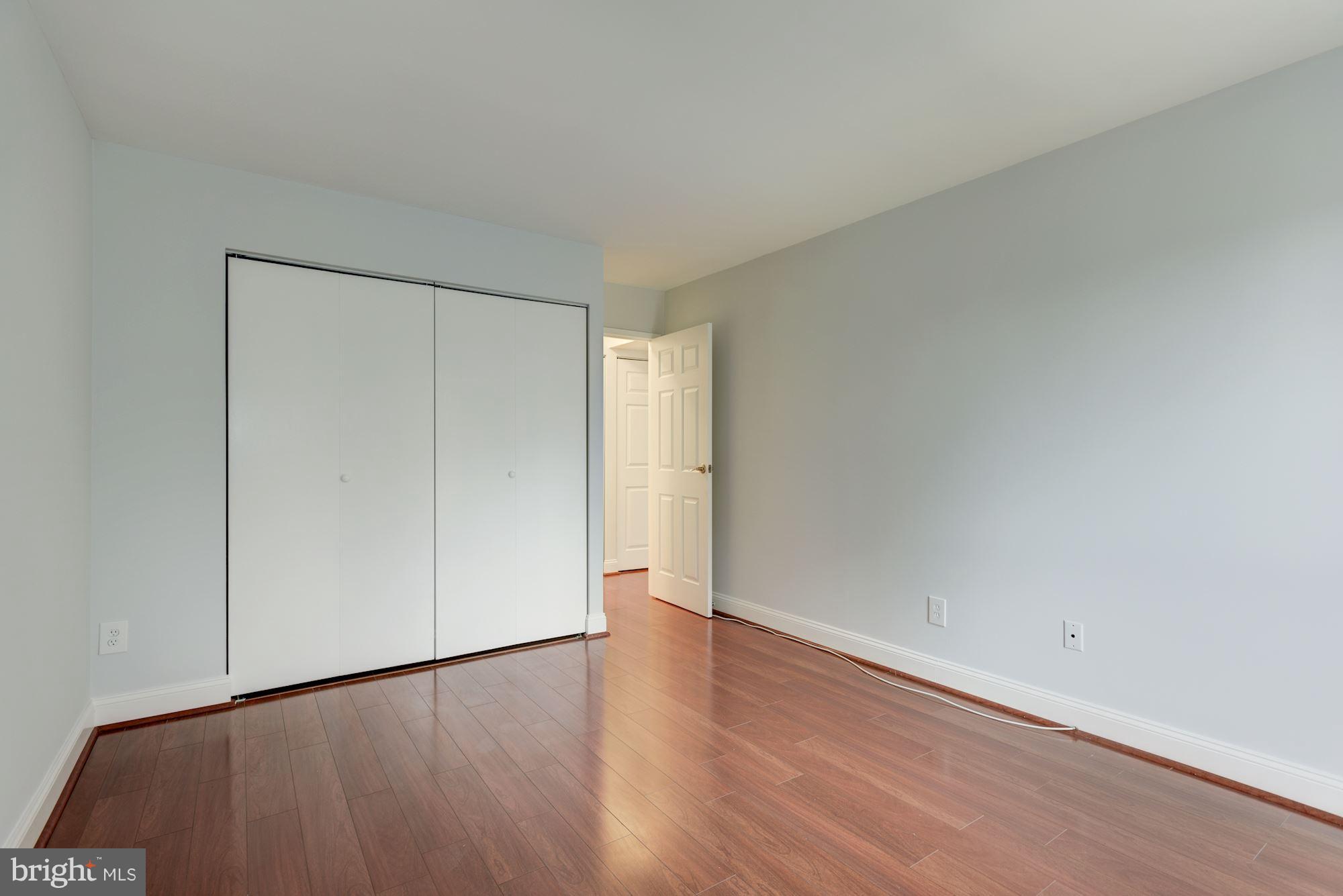 2018 Colts Neck Road, Unit 22 Reston, VA 20191 - Photo 14 of 26 Wood Floors in Bedrooms
